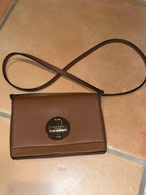 Brown Kate Spade Newbury Lane Sally crossbody bag with Gold-Tone Turn Lock
